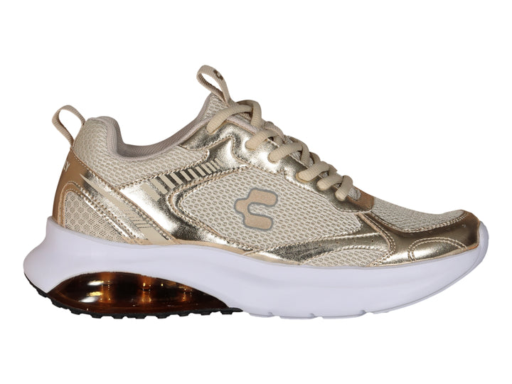 Tenis deportivos Charly color oro y beige con suela blanca y cámara de aire en el talón.