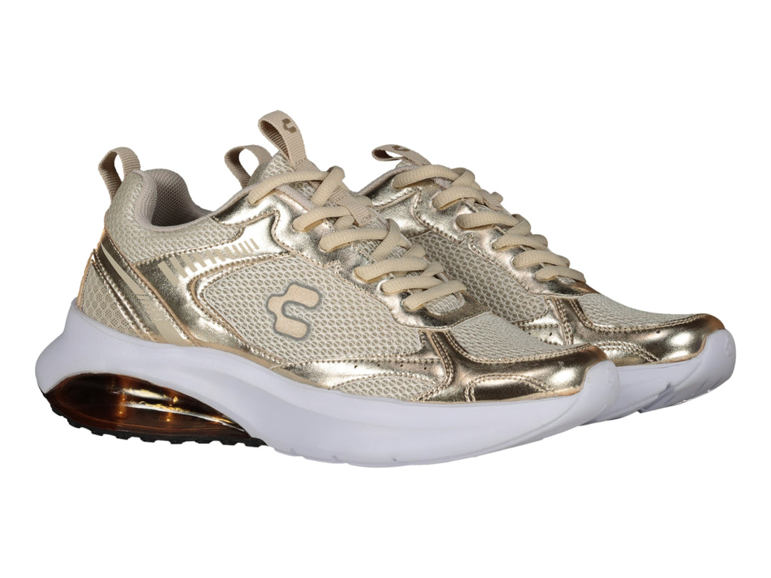 Tenis deportivos Charly color oro y beige con suela blanca y cámara de aire en el talón.