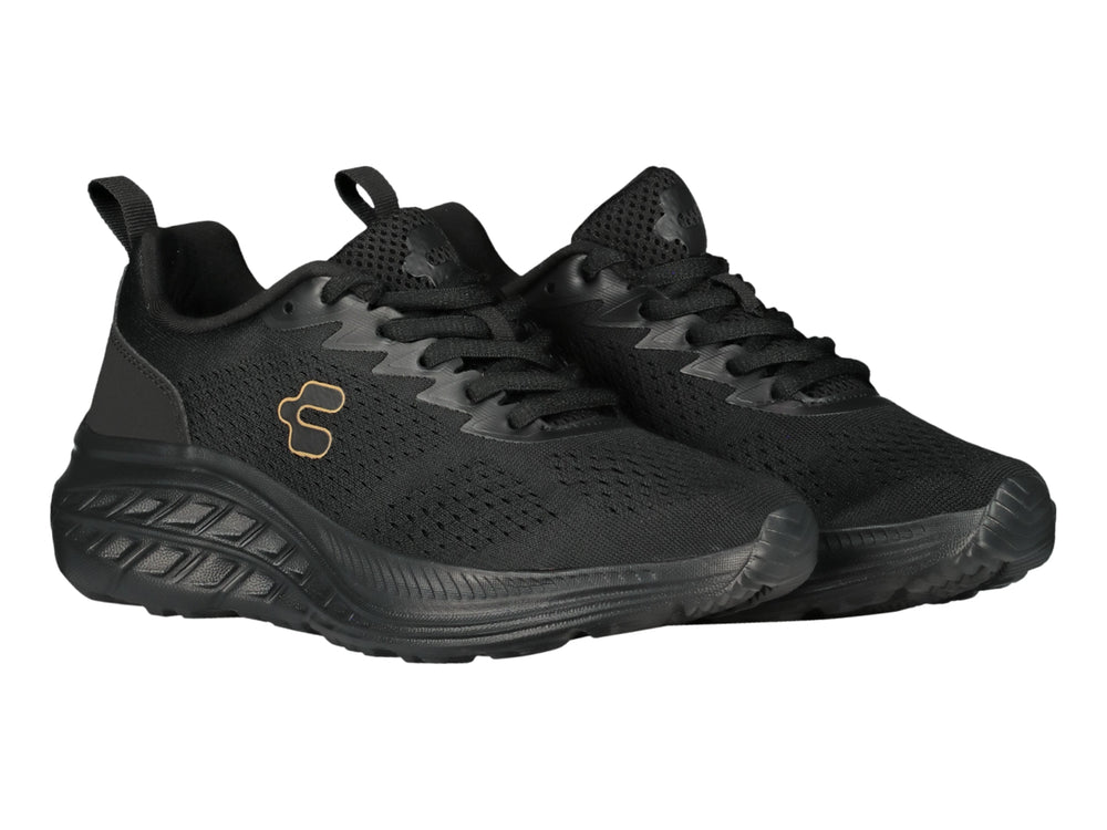 Tenis deportivos Charly de color negro con suela gruesa y tejido transpirable.