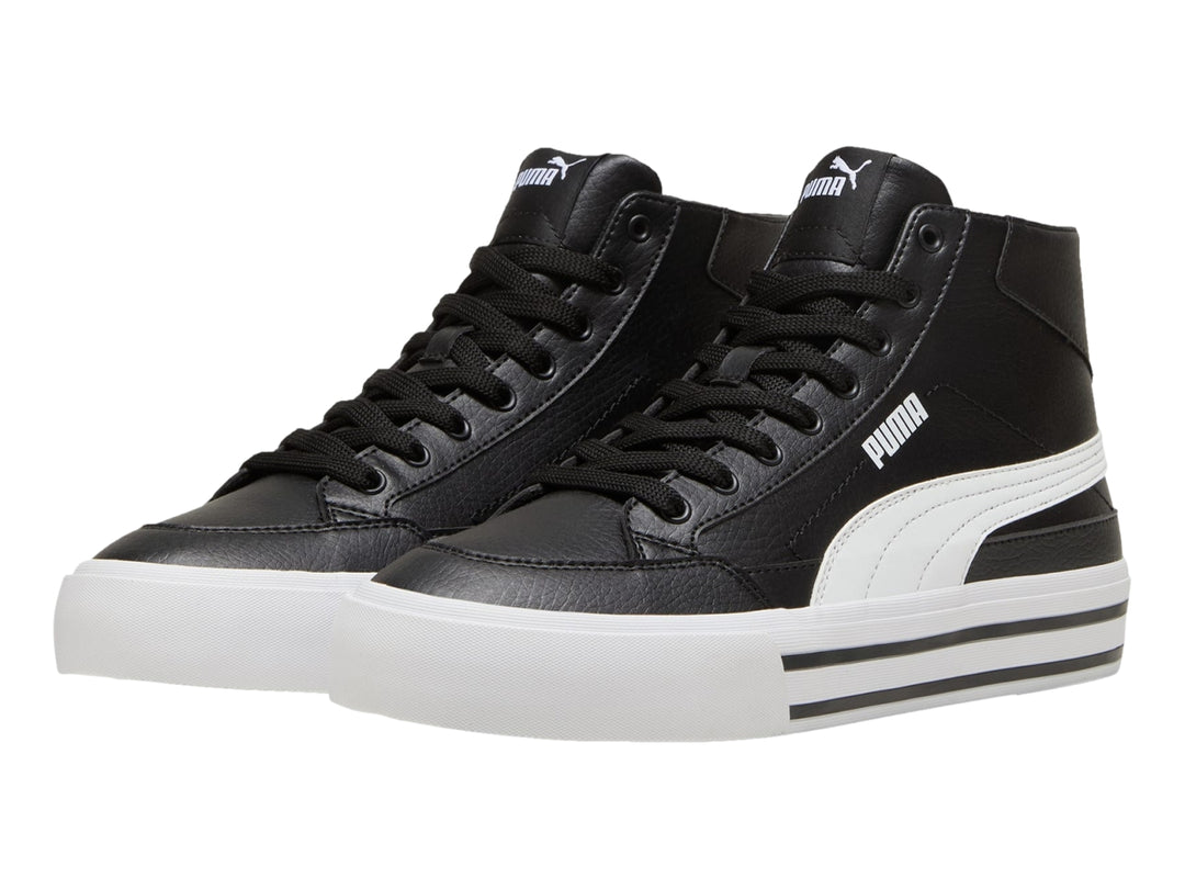Tenis PUMA de corte alto en color negro con suela blanca.