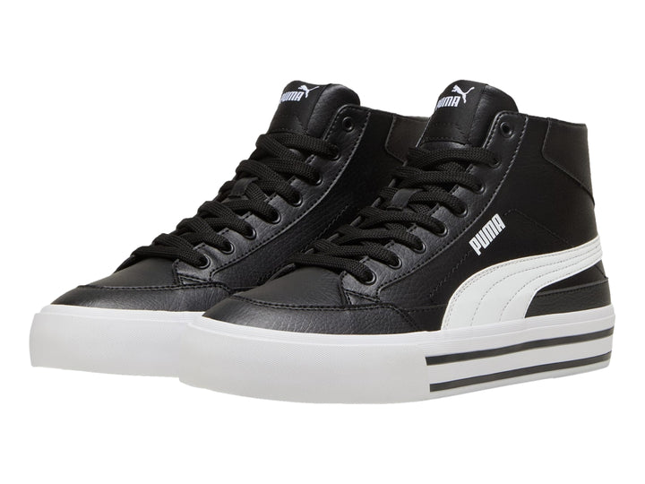 Tenis PUMA de corte alto en color negro con suela blanca.