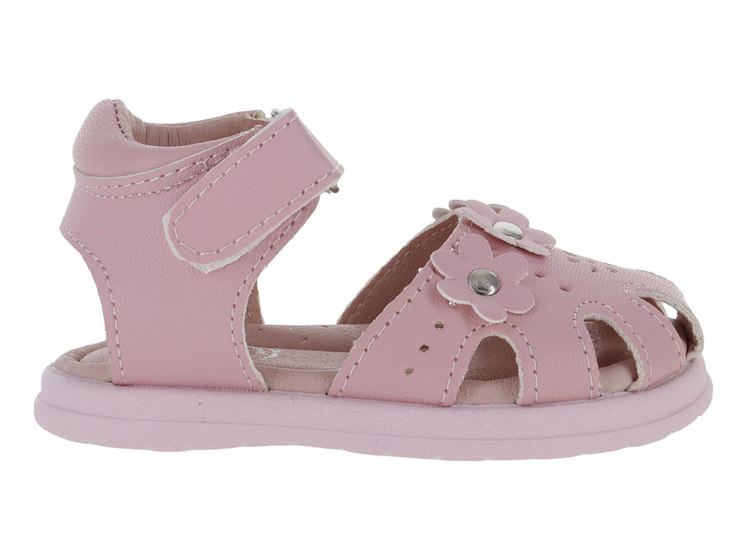 Sandalia rosa para niña con adorno de flor y correa de velcro.