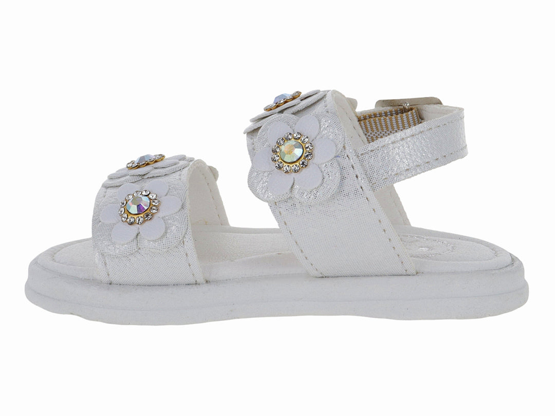 Sandalia blanca para niña con detalles de flores brillantes y hebilla plateada.