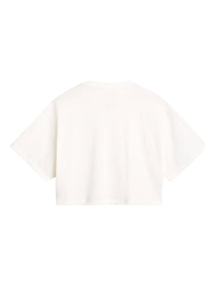 Playera corta VANS color marshmallow con gráfico beige en el pecho.