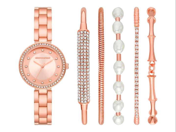 Set de 6 piezas que incluye un reloj y cinco pulseras en color rosa gold para mujer.