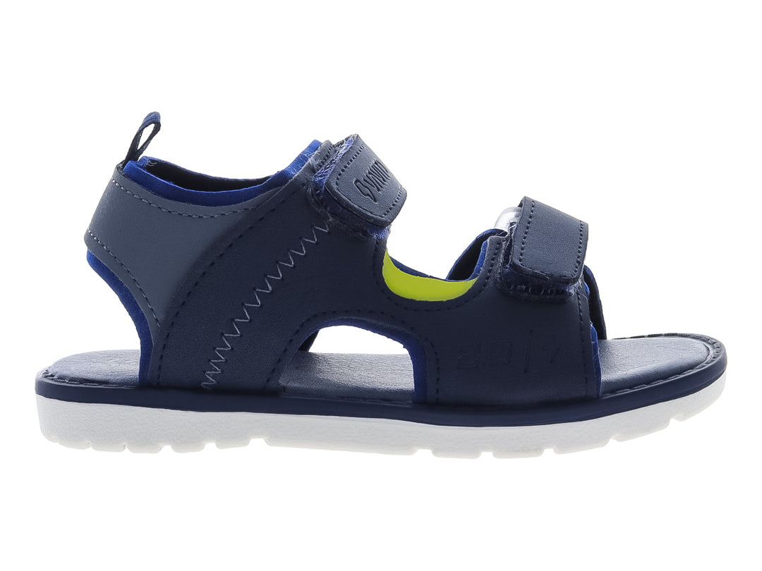 Sandalia infantil color azul marino con suela blanca y correas de ajuste con velcro.