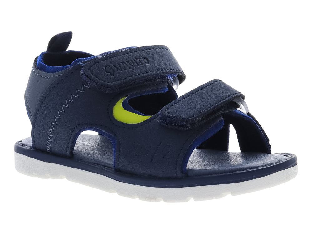 Sandalia infantil color azul marino con suela blanca y correas de ajuste con velcro.