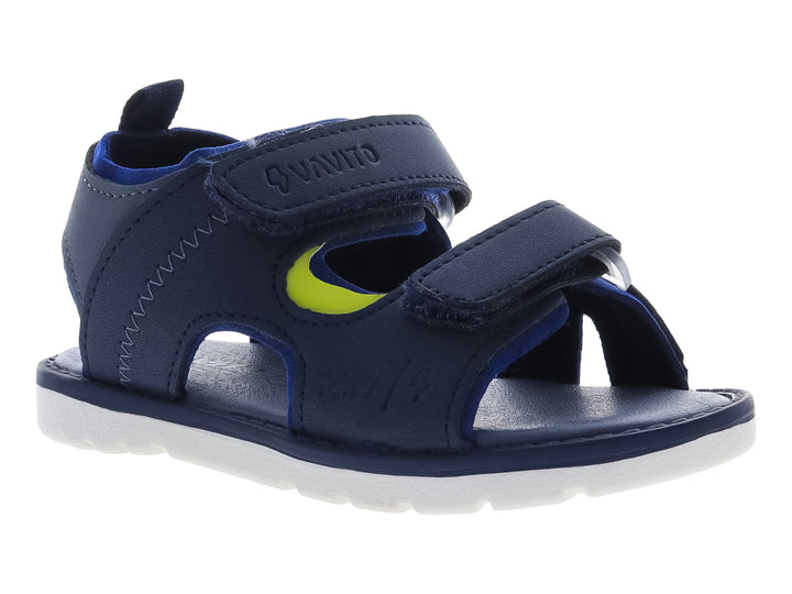 Sandalia infantil color azul marino con suela blanca y correas de ajuste con velcro.
