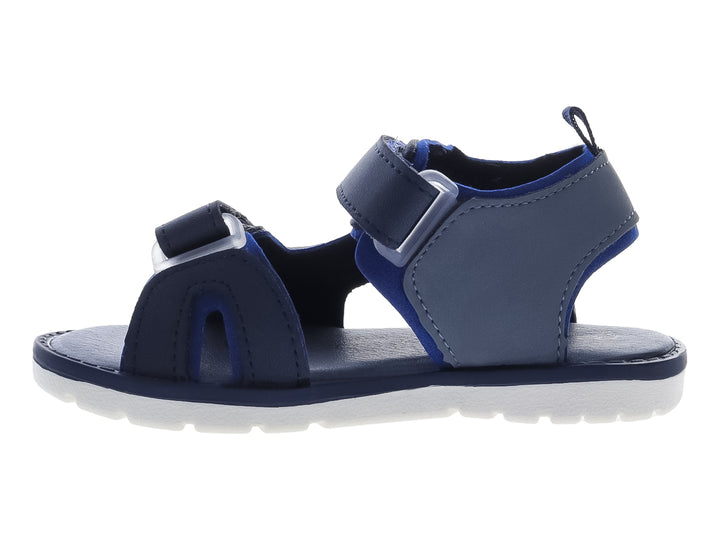 Sandalia infantil color azul marino con suela blanca y correas de ajuste con velcro.