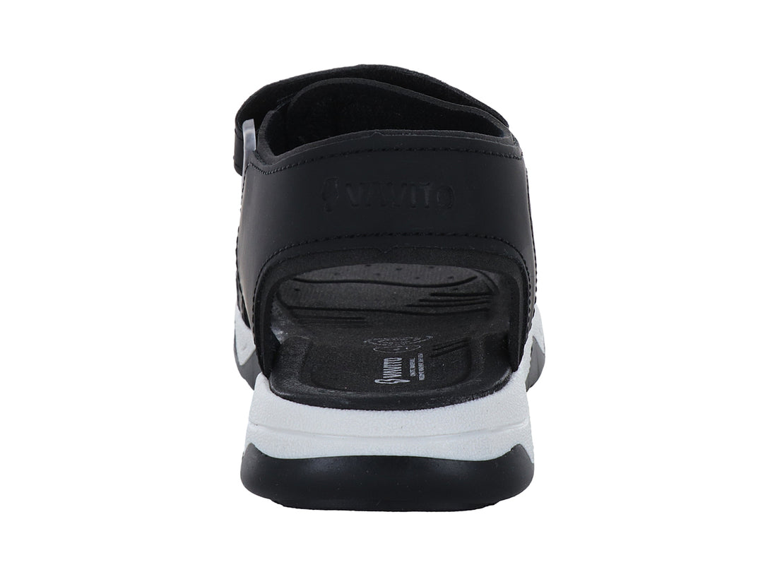 Sandalia deportiva para niño marca VAVITO en color negro con detalles en gris y suela blanca.