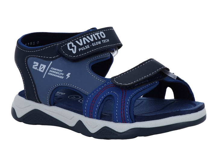 Sandalia deportiva para niño color azul rey con suela blanca y correas de ajuste con velcro.