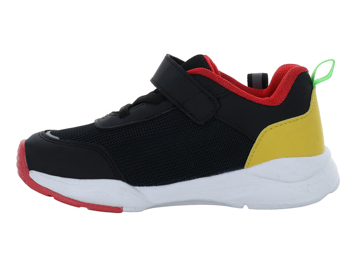Tenis deportivos infantiles VAVITO color negro con detalles en amarillo y rojo y suela blanca.