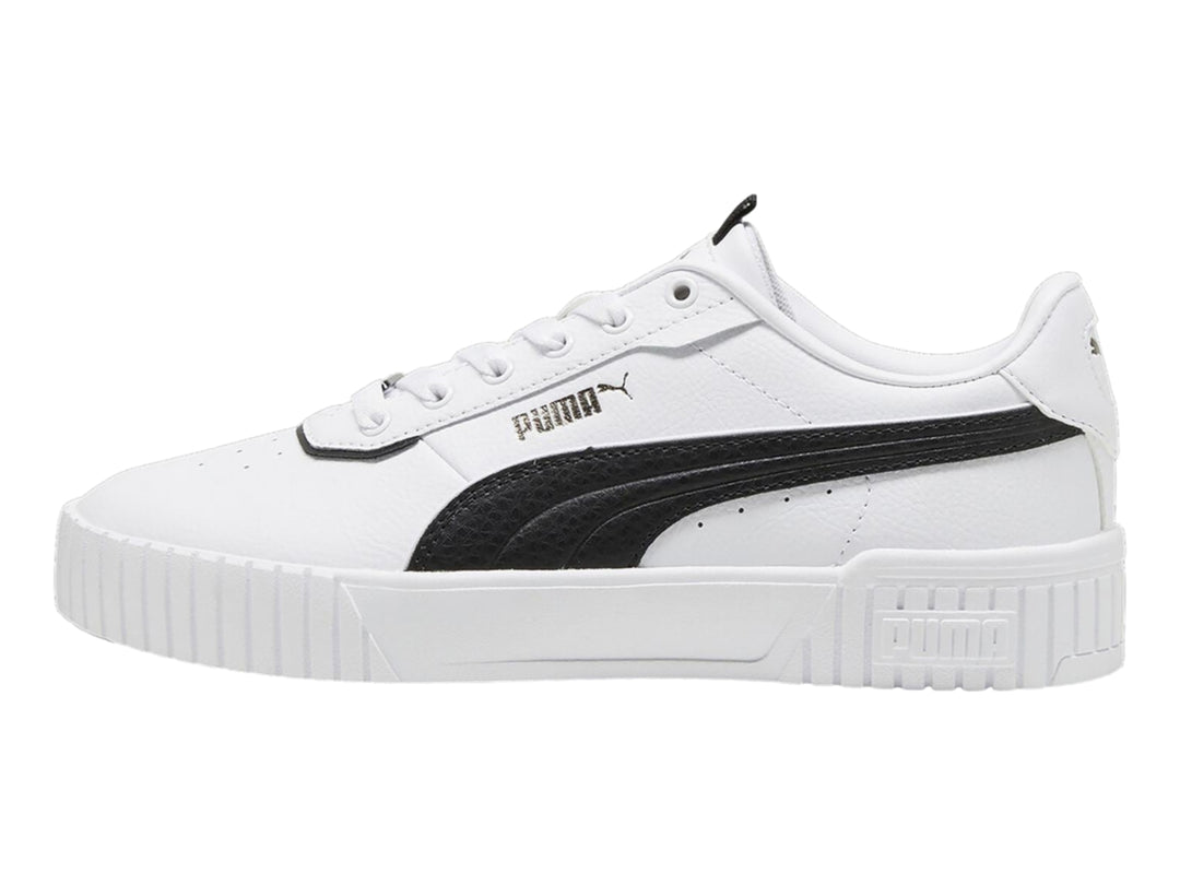 Tenis PUMA Carina 2.0 Lux color blanco con franja negra lateral y suela de plataforma blanca.