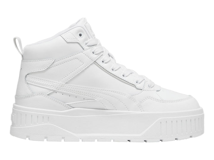 Tenis PUMA blancos de corte medio con suela de plataforma gruesa.