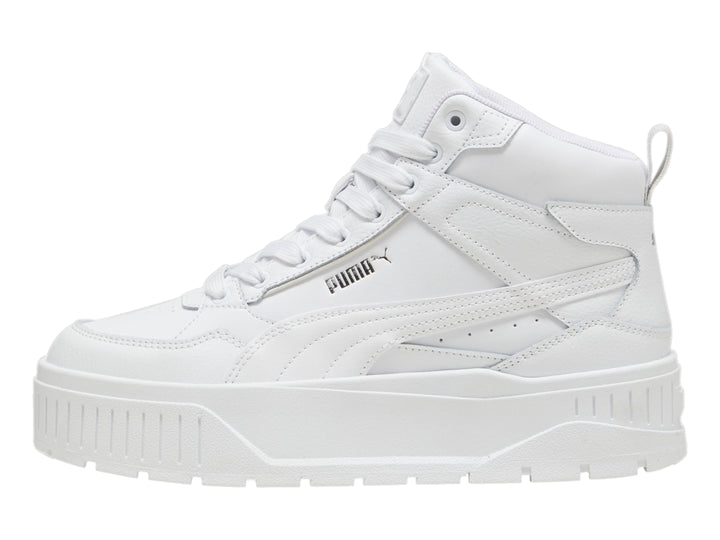 Tenis PUMA blancos de corte medio con suela de plataforma gruesa.
