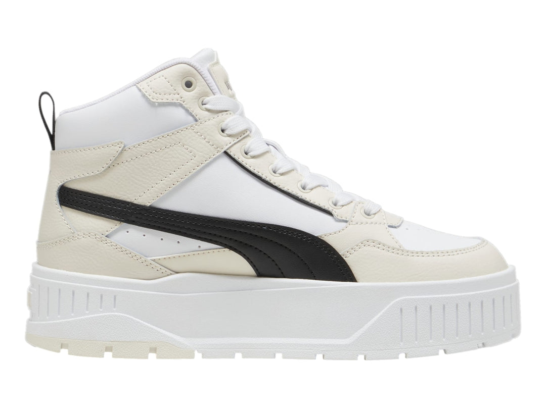 Tenis PUMA Karmen II Idol Mid en color blanco y negro con suela de plataforma elevada.