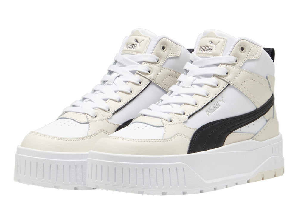 Tenis PUMA Karmen II Idol Mid en color blanco y negro con suela de plataforma elevada.