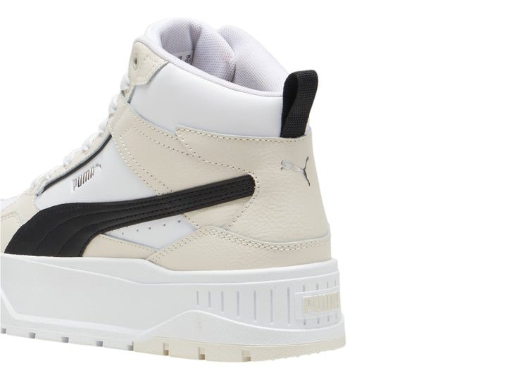 Tenis PUMA Karmen II Idol Mid en color blanco y negro con suela de plataforma elevada.