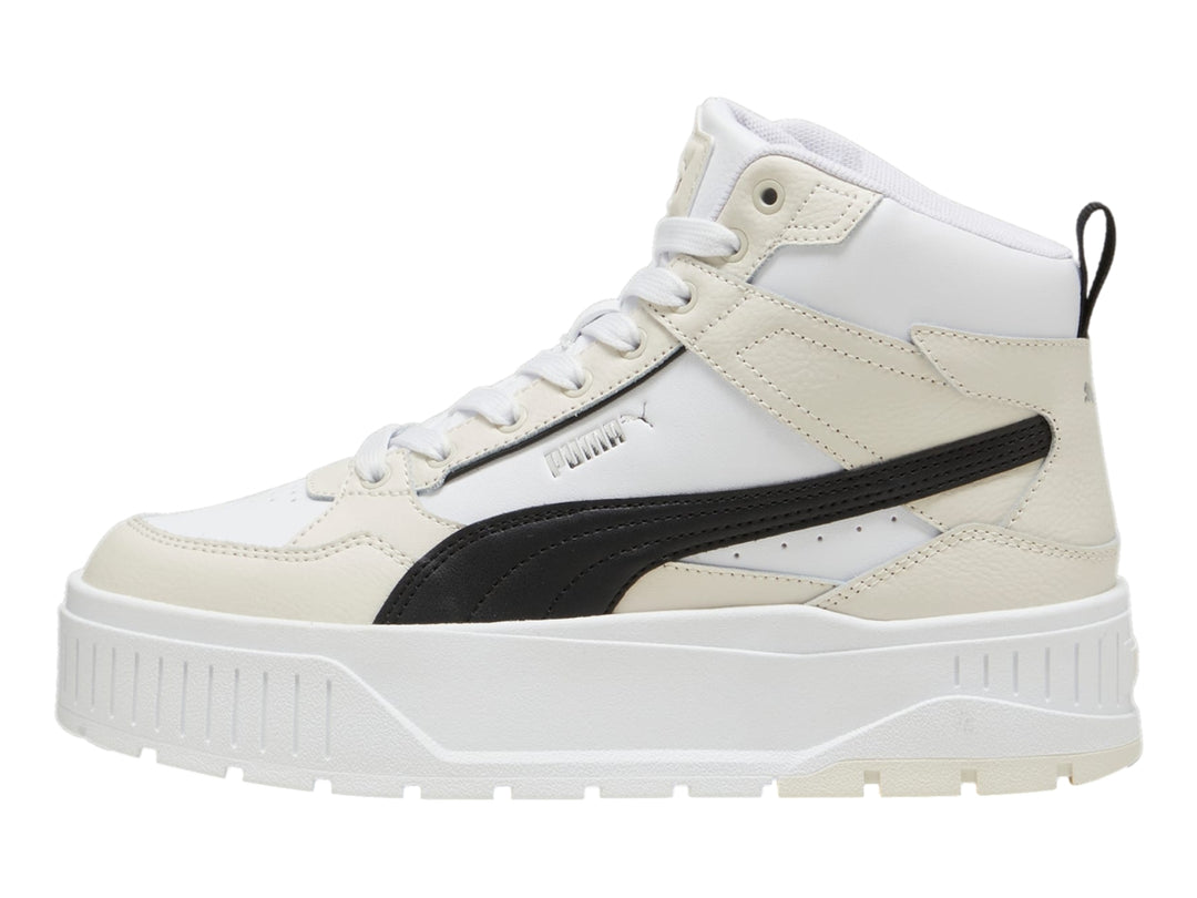 Tenis PUMA Karmen II Idol Mid en color blanco y negro con suela de plataforma elevada.