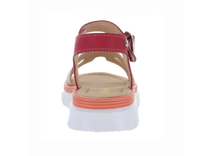 Sandalia infantil de plataforma con correas en color rojo y beige, suela blanca dentada y cierre de hebilla.