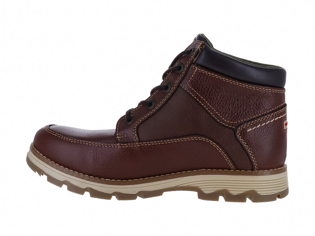 Botín de cuero marrón Hush Puppies con cordones y suela beige dentada.