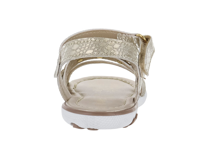 Sandalia para niña color oro con adornos de flores y suela blanca.