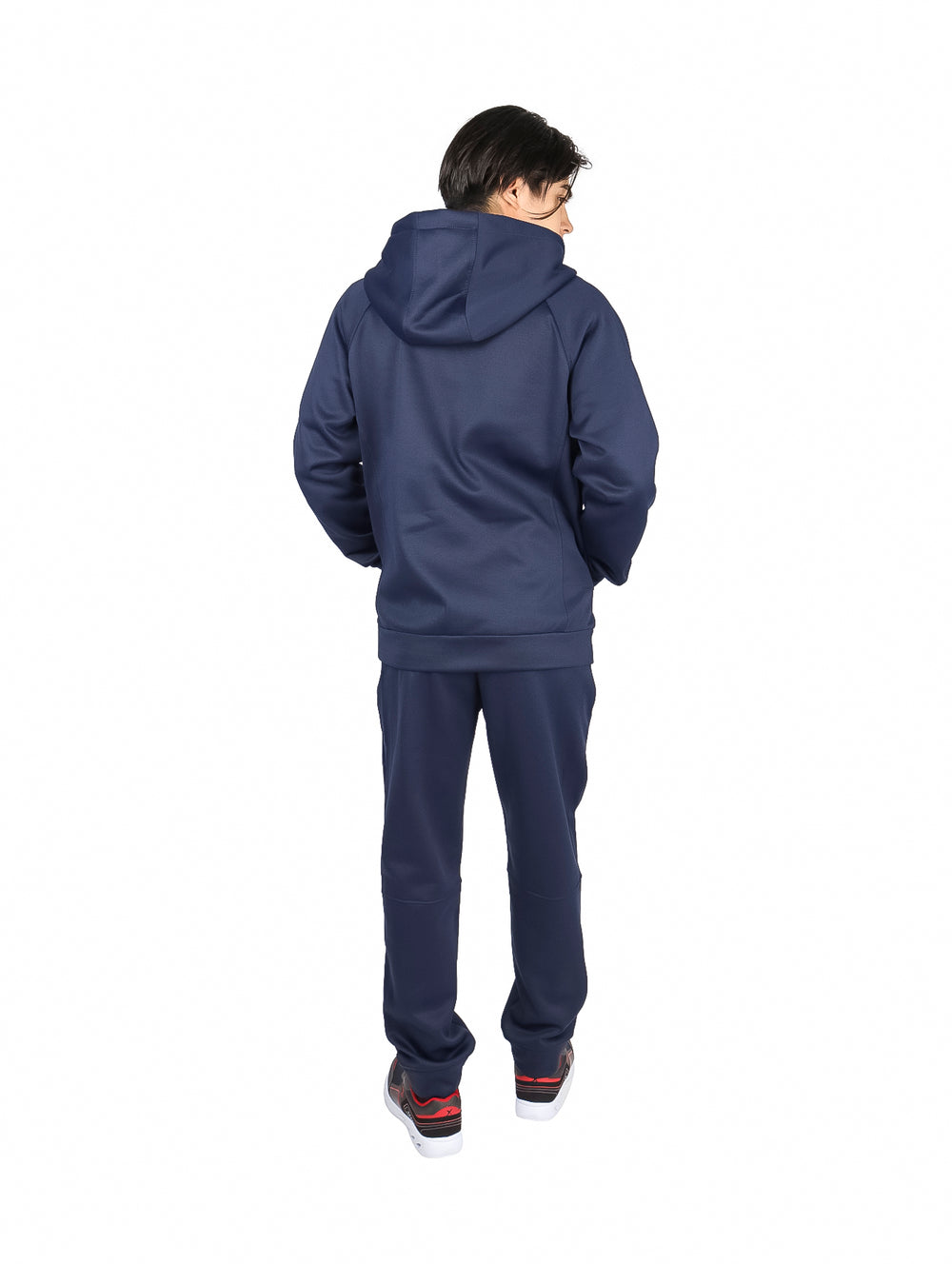 Conjunto deportivo azul marino compuesto por sudadera con capucha y pantalón coordinado.