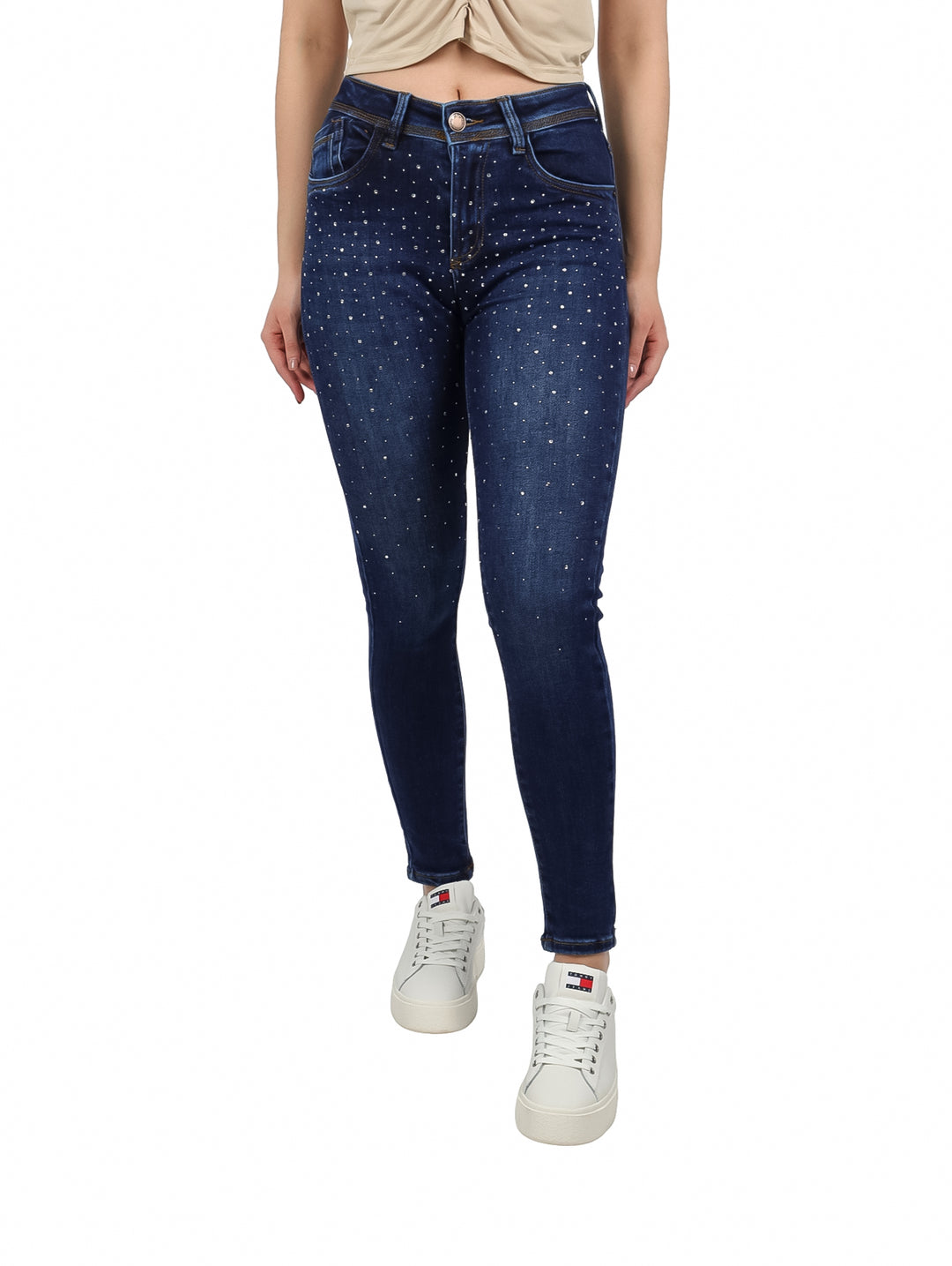 Jeans skinny color azul oscuro con pequeños detalles de piedras blancas brillantes.