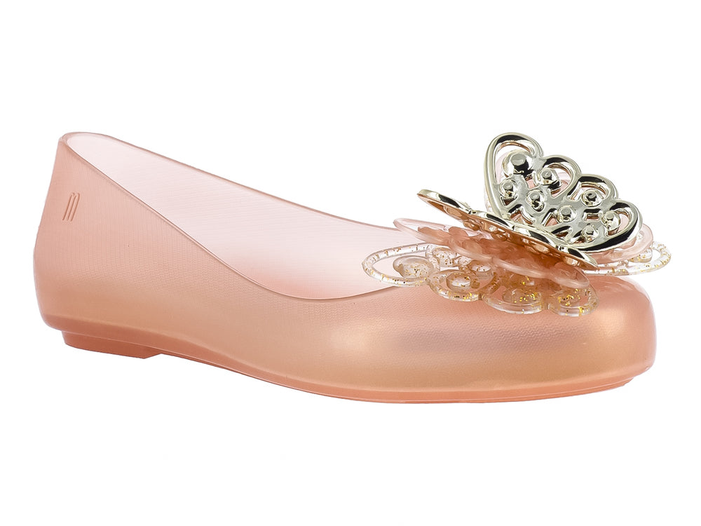 Zapato plano Mini Melissa color oro con adorno brillante en la punta.