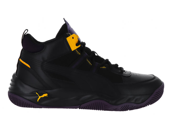 Tenis PUMA Rebound Future Nextgen color negro con suela morada y detalles en naranja.