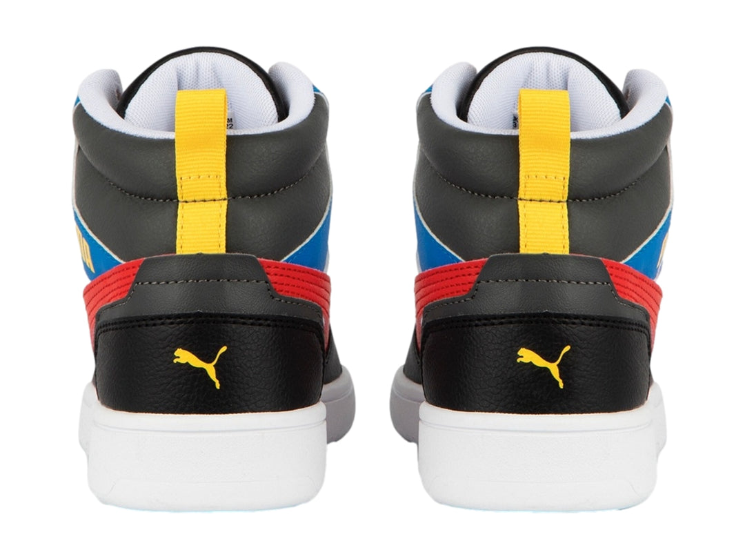 Tenis PUMA Rebound V6 Mid JR multicolores en blanco, rojo, azul y negro con suela blanca.