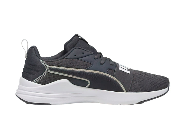Tenis PUMA Wired Run Pure en color gris oscuro con suela blanca y detalles lineales claros.