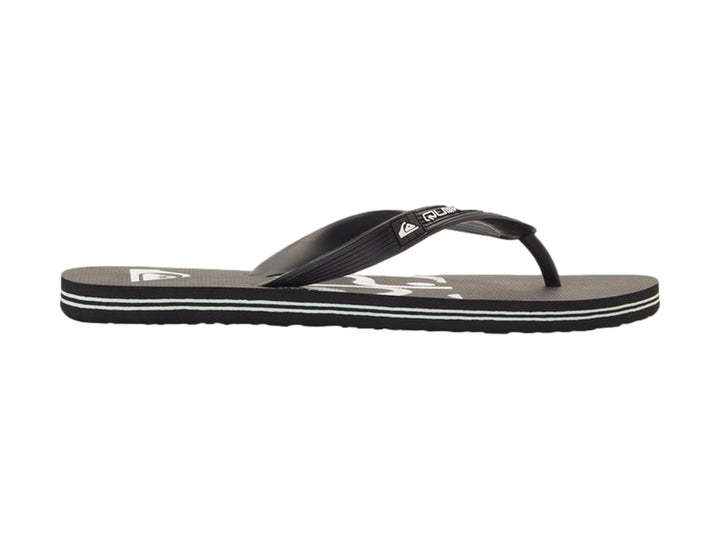 Sandalias Quiksilver color negro con rayas blancas en la suela.