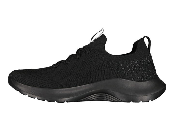 Tenis deportivos color negro con tejido transpirable y suela gruesa.
