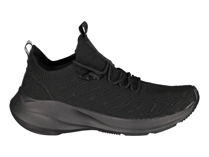 Tenis deportivos Charly color negro total con tejido transpirable y suela robusta.