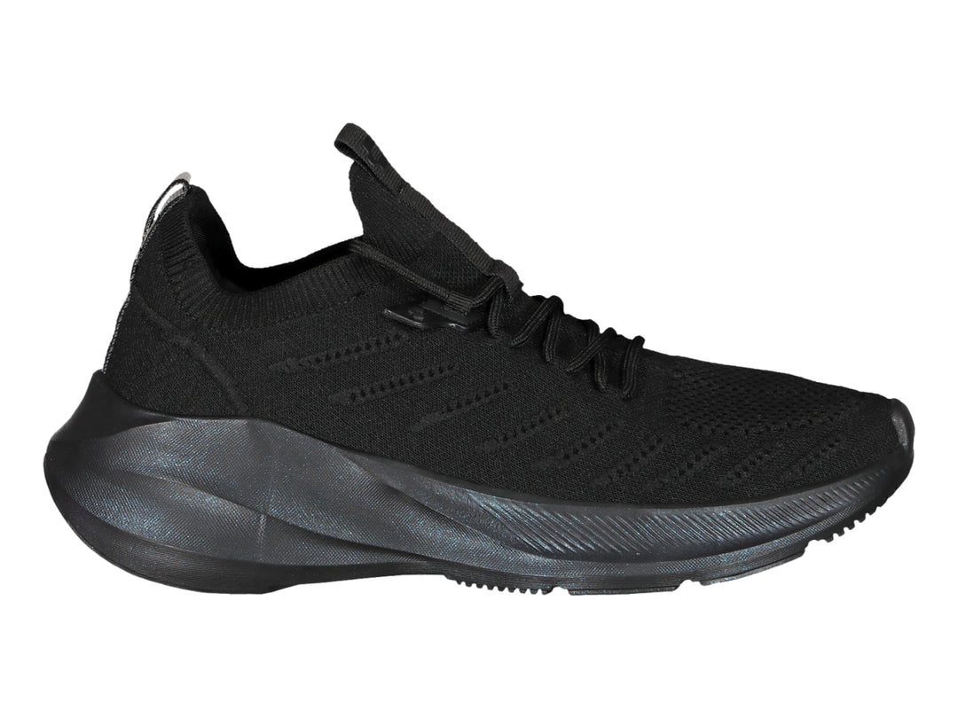 Tenis deportivos Charly color negro total con suela robusta y parte superior de tela transpirable.