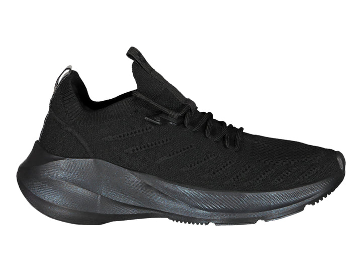 Tenis deportivos Charly color negro total con suela robusta y parte superior de tela transpirable.