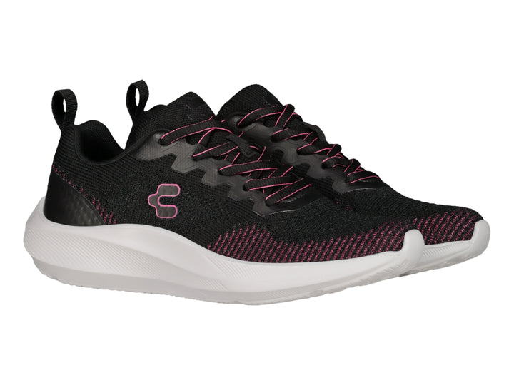 Tenis deportivos Charly color negro con detalles en fucsia y suela blanca.