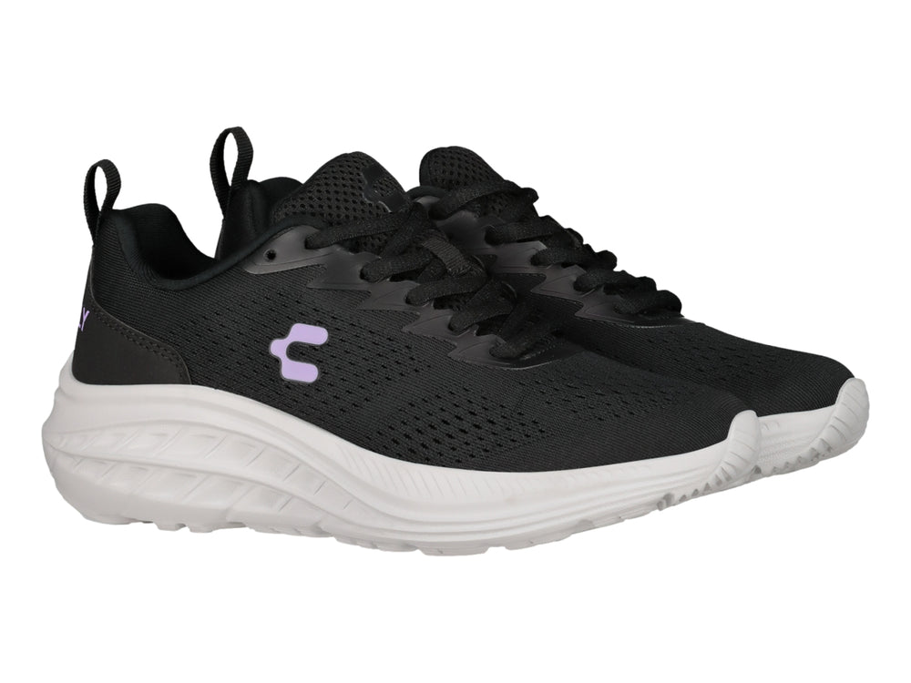 Tenis deportivos Charly color negro con suela blanca y logo morado.