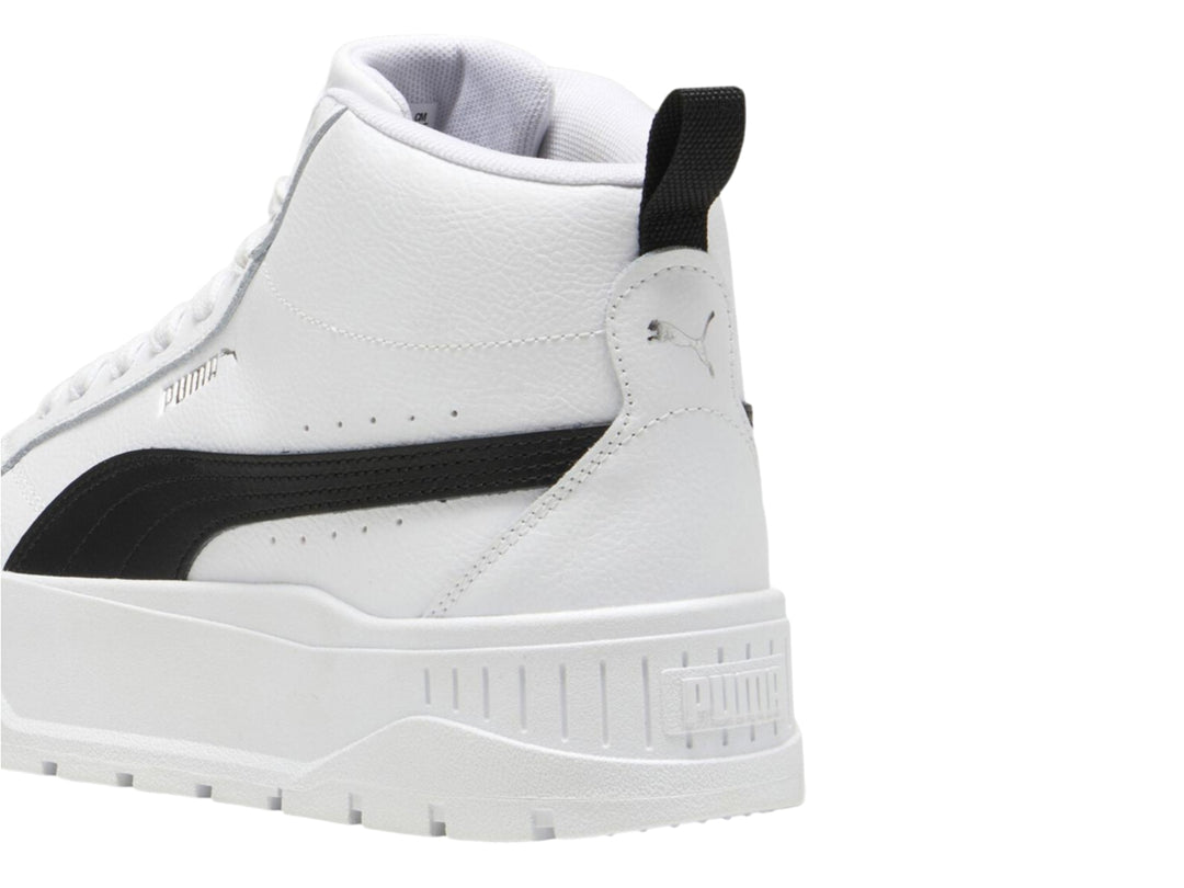 Tenis PUMA Karmen II Mid en color blanco con franja negra lateral y suela de plataforma blanca.