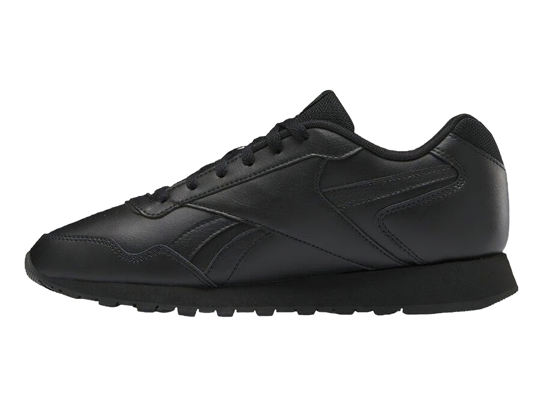 Tenis deportivos Reebok color negro con suela negra y logotipo lateral.