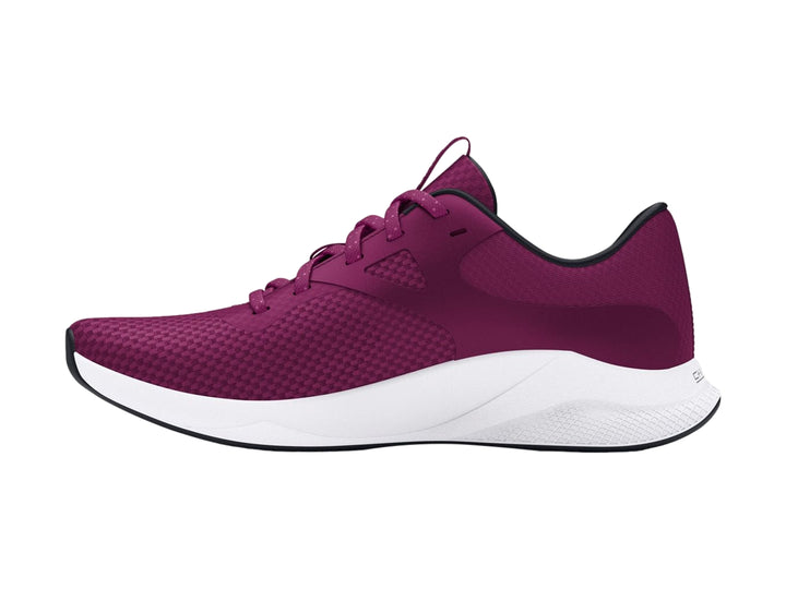 Zapato deportivo Under Armour color morado con suela blanca y detalles en malla.