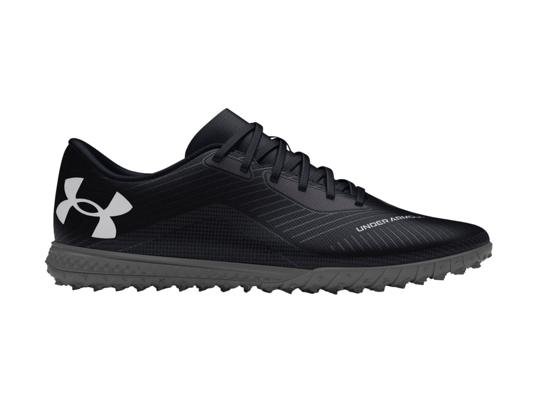 Zapato de fútbol Under Armour Shadow Select Turf color negro con suela para césped sintético.