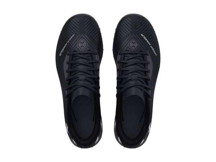 Zapato de fútbol Under Armour Shadow Select Turf color negro con suela para césped sintético.