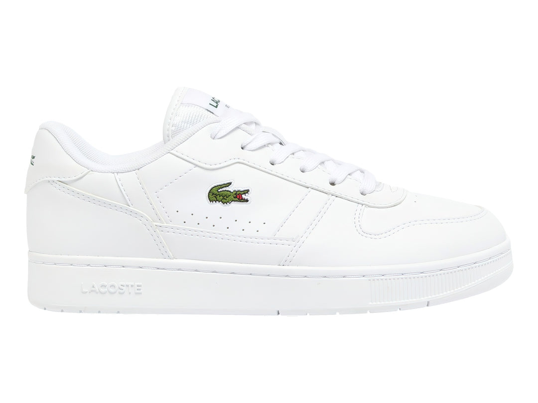 Tenis blancos para niños marca Lacoste con logotipo de cocodrilo verde en el lateral.