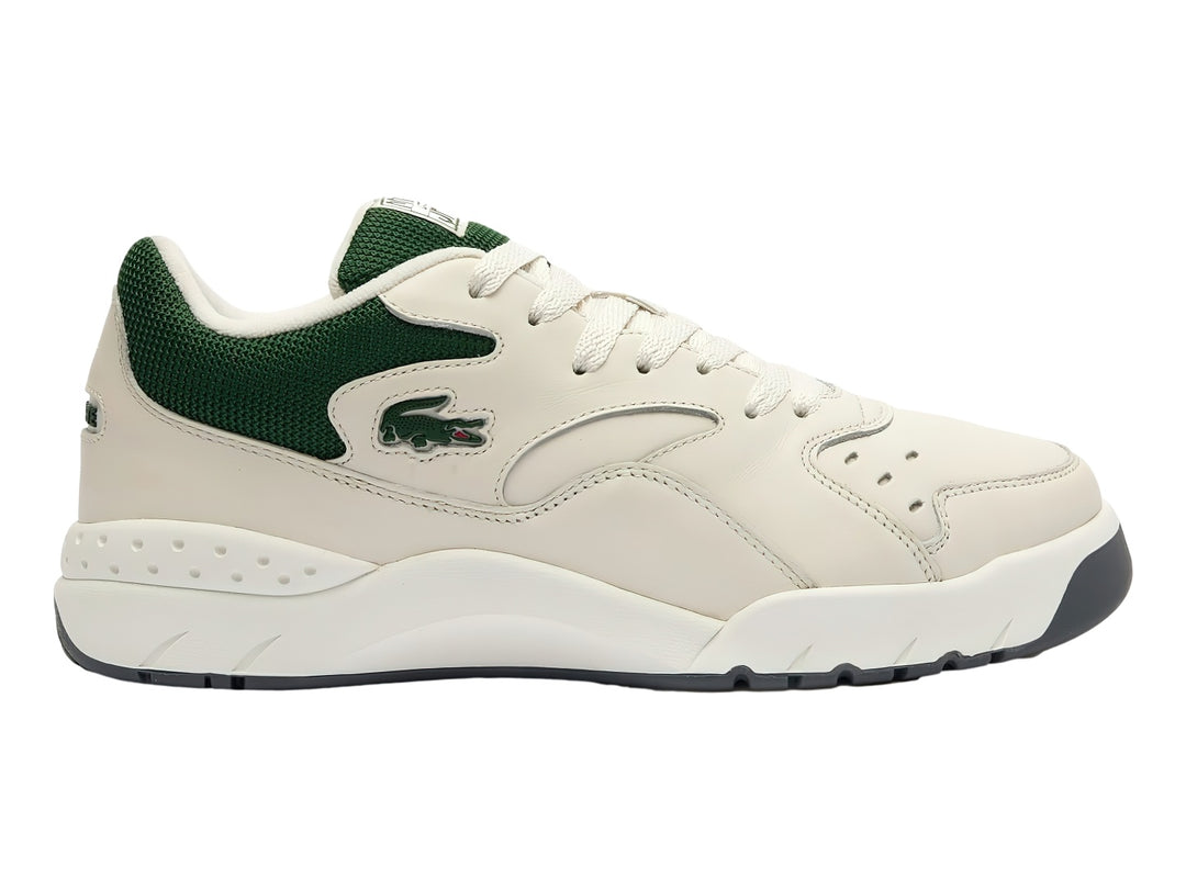 Tenis Lacoste color blanco con detalles en verde oscuro y suela blanca, estilo deportivo casual.