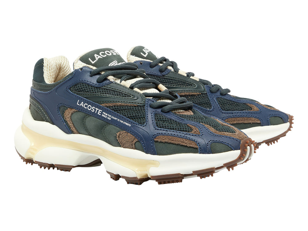 Tenis Lacoste deportivos en colores verde oscuro, azul y café con suela blanca gruesa y base de goma.