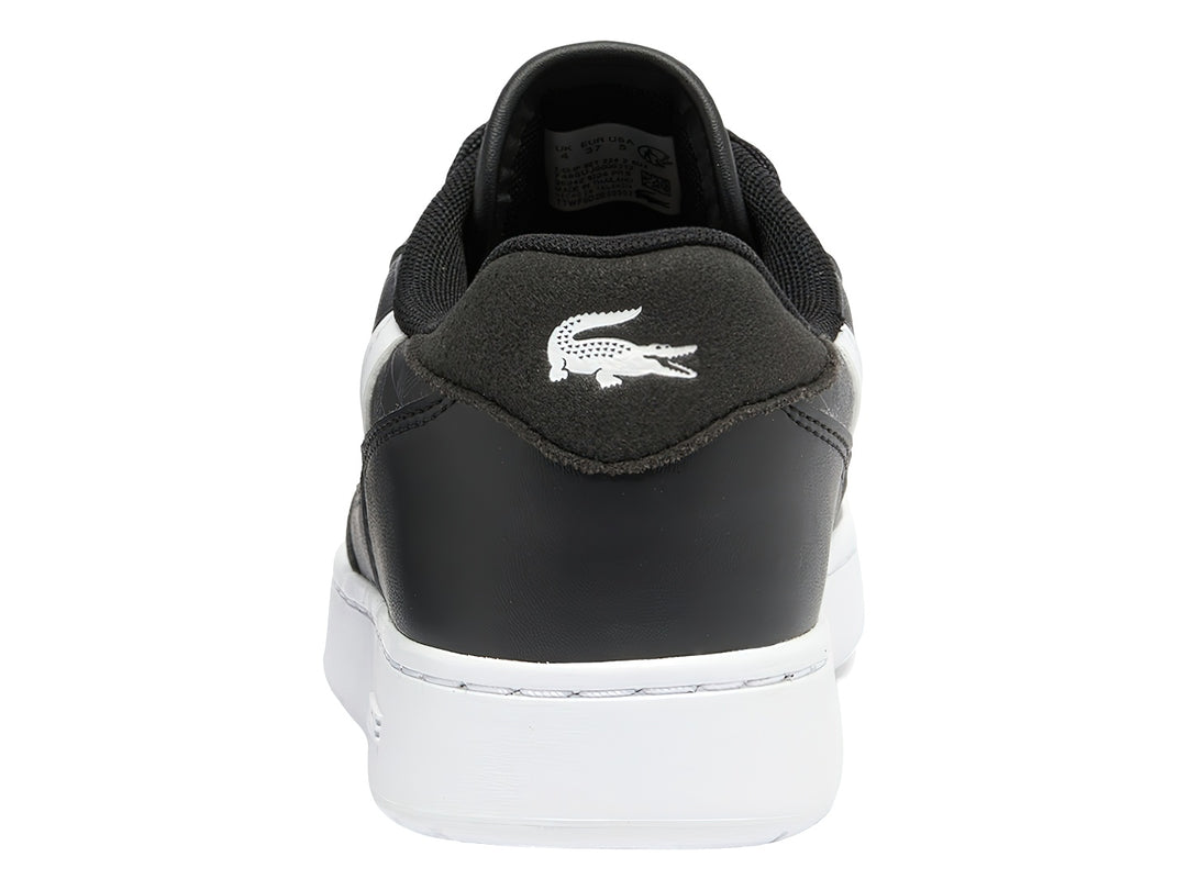 Tenis Lacoste T-Clip para niños en color negro con suela y detalles en blanco.