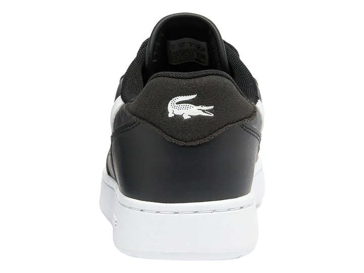 Tenis Lacoste T-Clip para niños en color negro con suela y detalles en blanco.