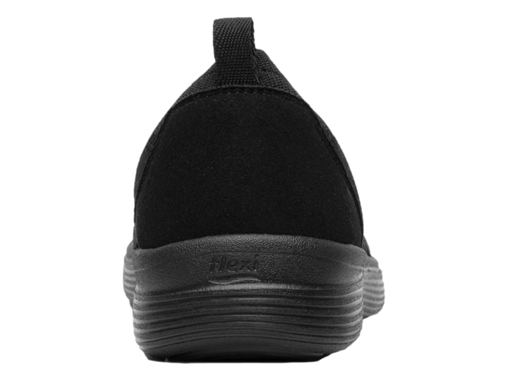 Zapato plano Flexi color negro, estilo slip-on con acabado en tela tejida y suela cómoda.
